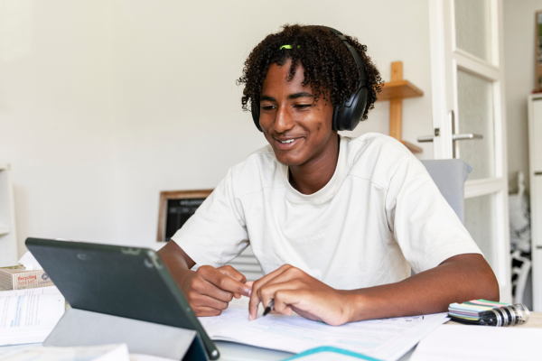 Black teen on ipad